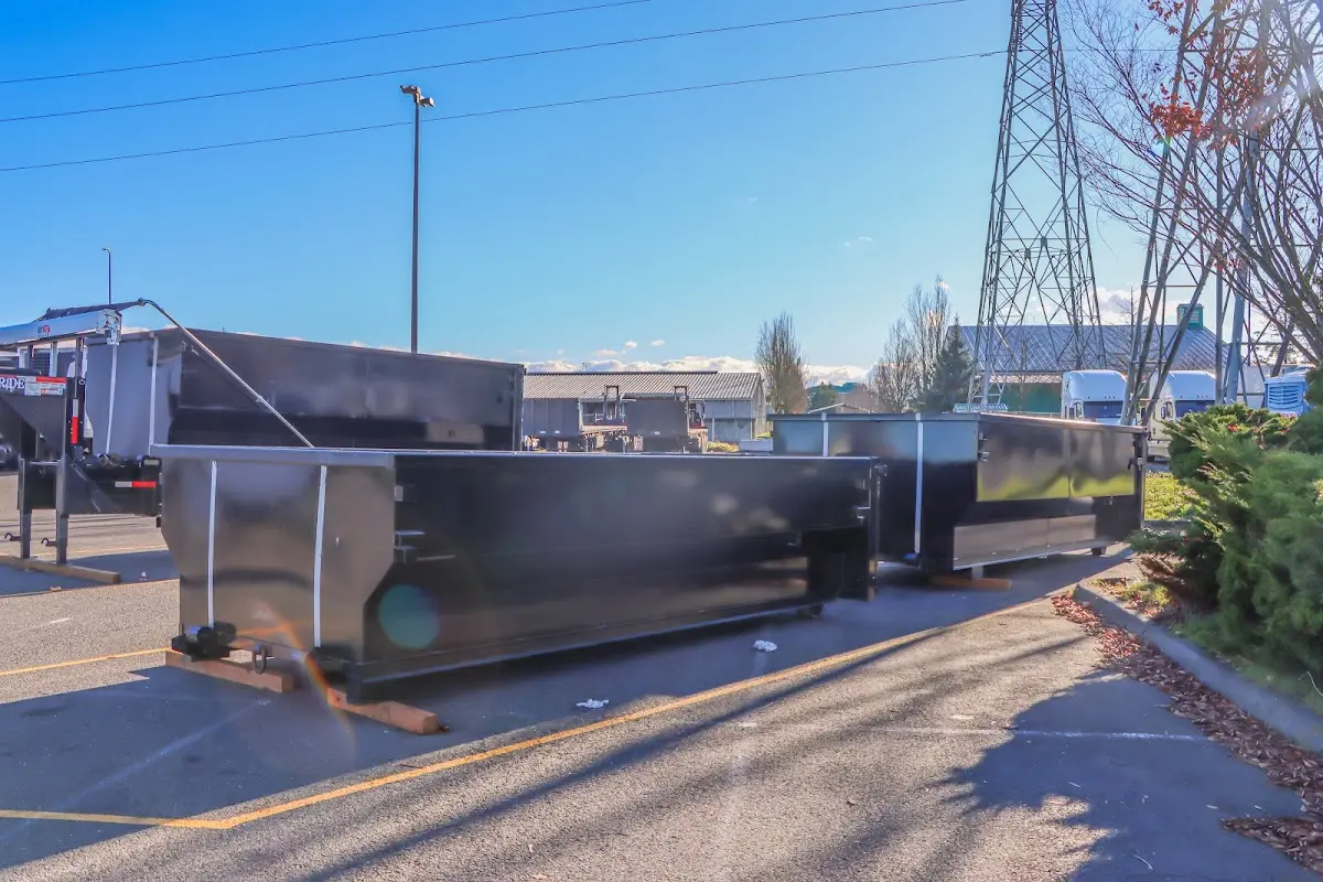 Roll-off dumpster ready for waste disposal at job site for 4 Yard Dumpster Rental in Livingston